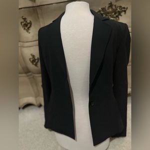 - Classic black blazer size 6